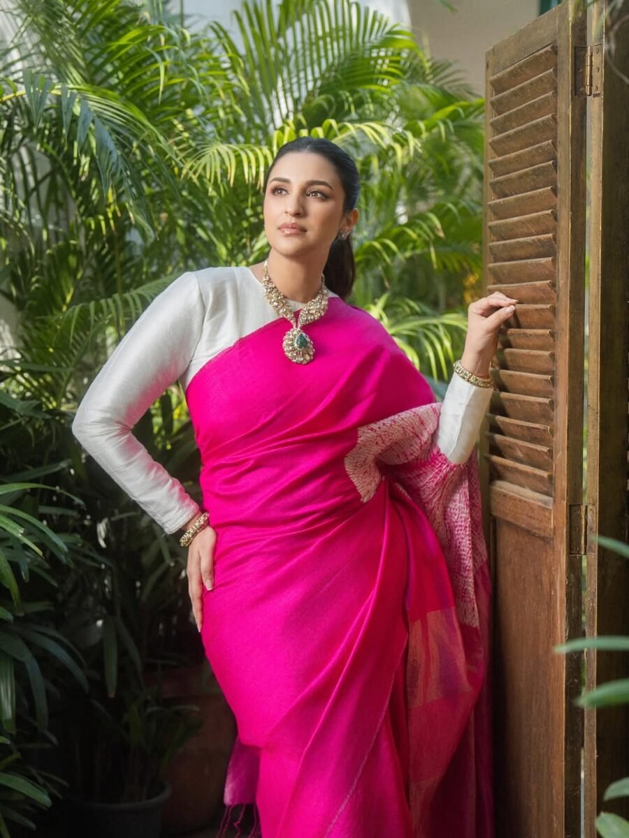 Parineeti Chopra in a bright pink saree during her first public appearance as a new mom