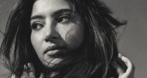 Bold, Edgy, and Unfiltered: Sara Arjun Redefines Modern Luxe in AK|OK Sara Arjun posing in a printed Anamika Khanna AKOK