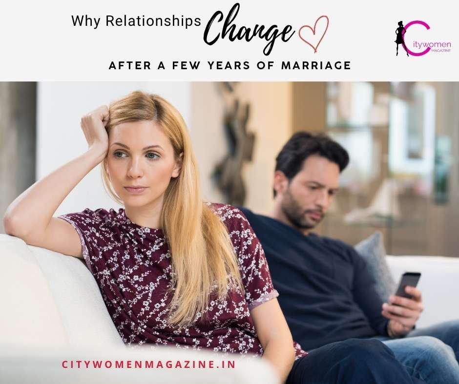 Married couple sitting together on a couch, reflecting on changes in their relationship over the years